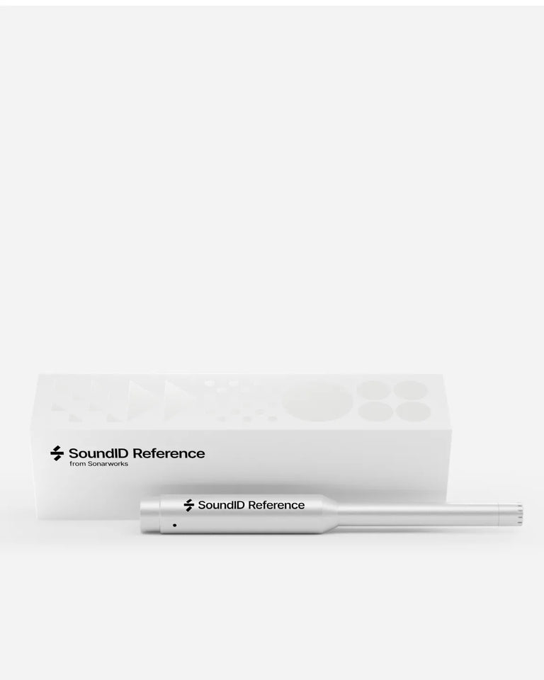 SoundID Reference measurement microphone from Sonarworks placed in front of its white packaging box with geometric pattern details on a light background.